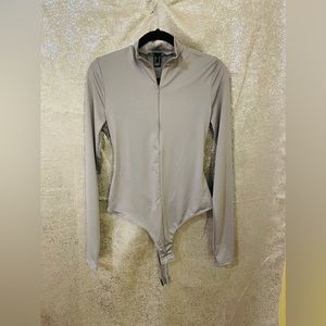 Charcoal Grey body suit, size XL. Good condition.